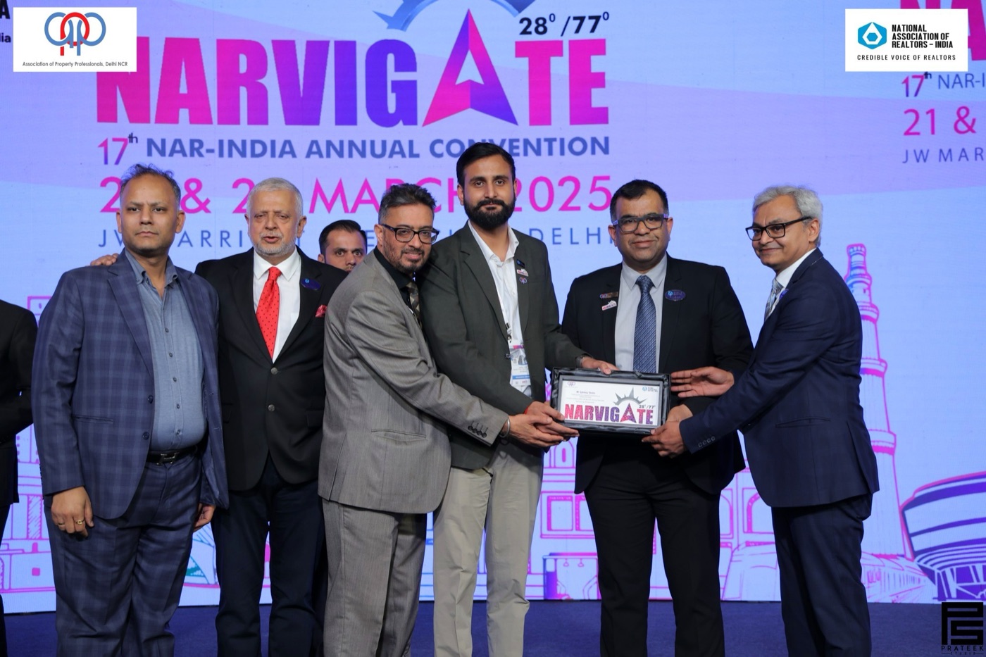 Sam Chopra on stage at the 17th NAR-India Annual Convention, NARVIGATE 2025, JW Marriott New Delhi